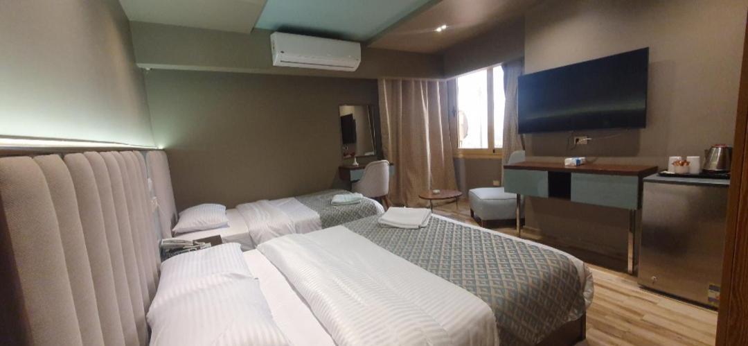 Grand Bayan Hotel & Apt At Nile Plaza Каир Номер фото