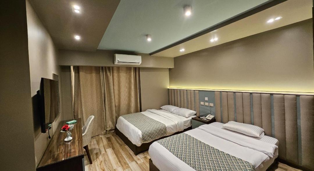 Grand Bayan Hotel & Apt At Nile Plaza Каир Номер фото