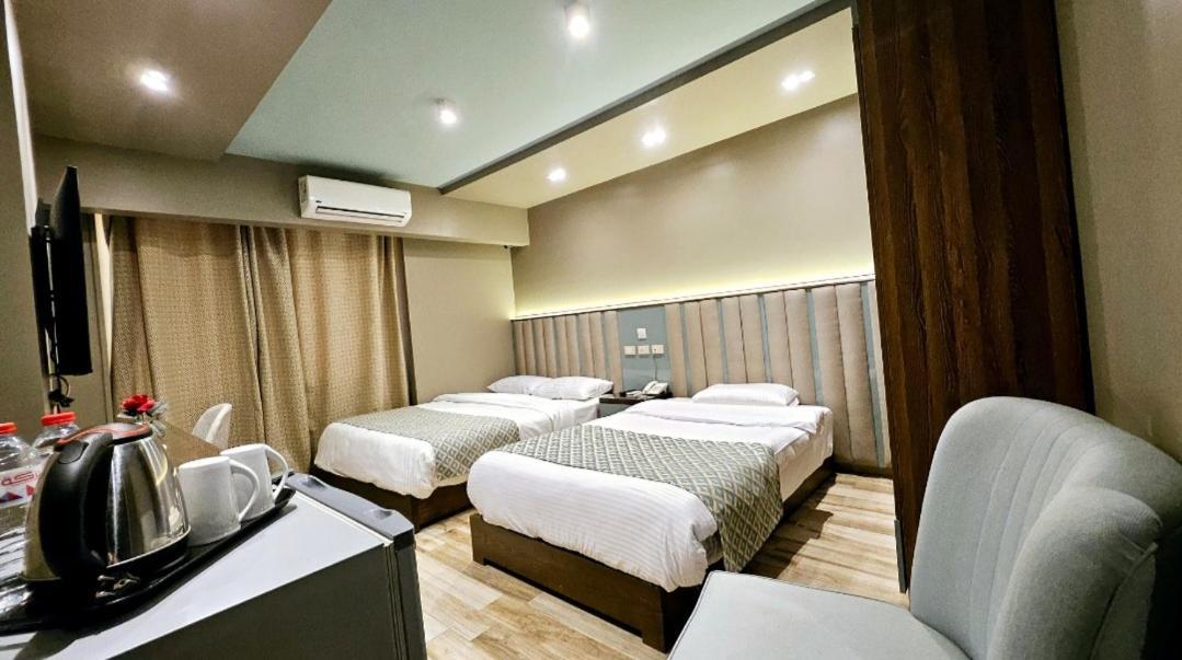 Grand Bayan Hotel & Apt At Nile Plaza Каир Номер фото