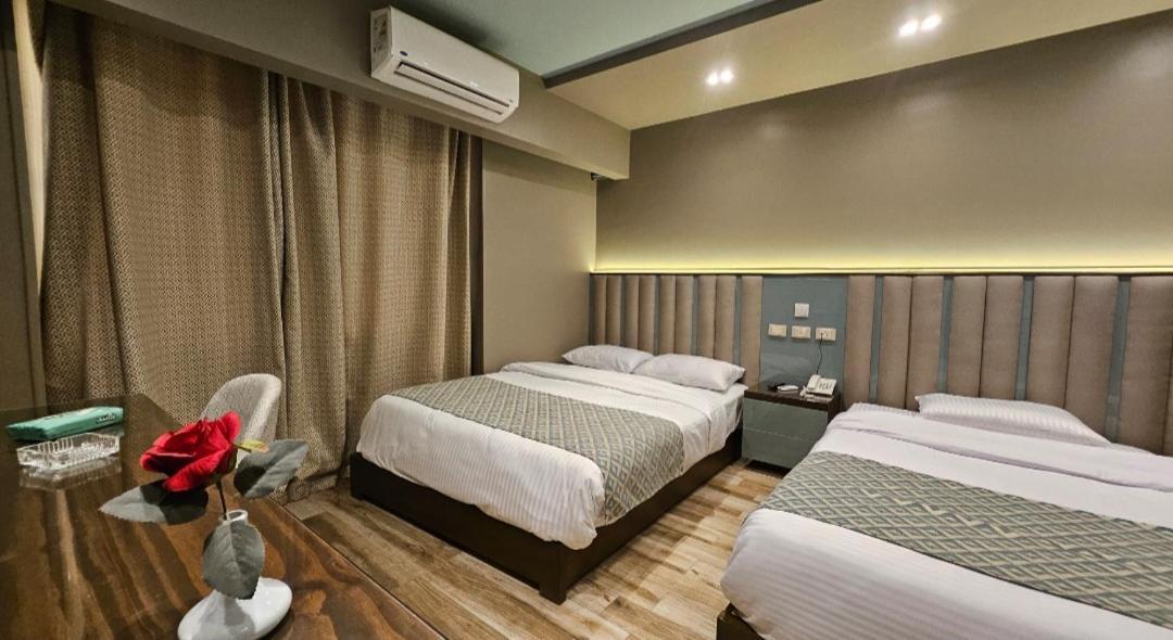 Grand Bayan Hotel & Apt At Nile Plaza Каир Номер фото