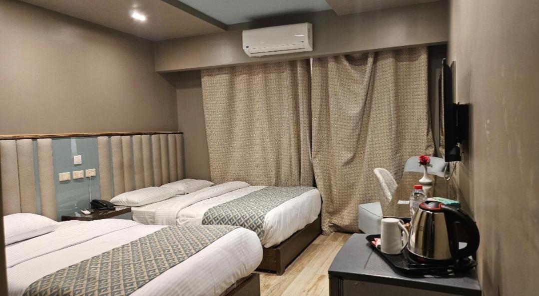 Grand Bayan Hotel & Apt At Nile Plaza Каир Номер фото